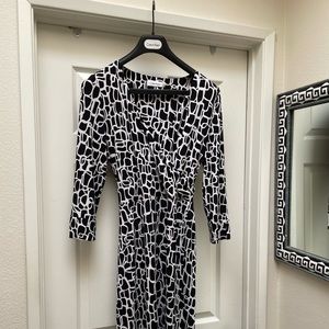 Calvin Klein Black and White pattern wrap dress.
